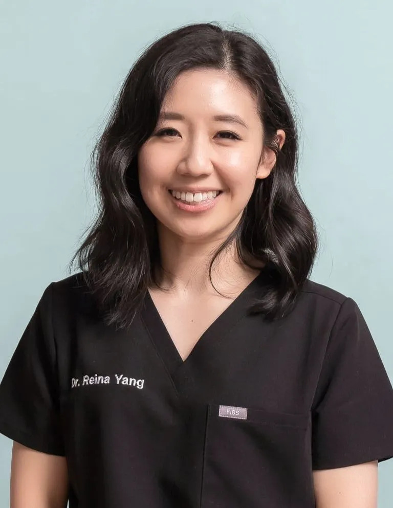 Portrait of Dr Reina Yang, a cosmetic and dental implant dentist in Melbourne